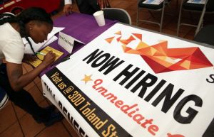 Job Seekers Look For Open Positions At Career Fair In San Francisco