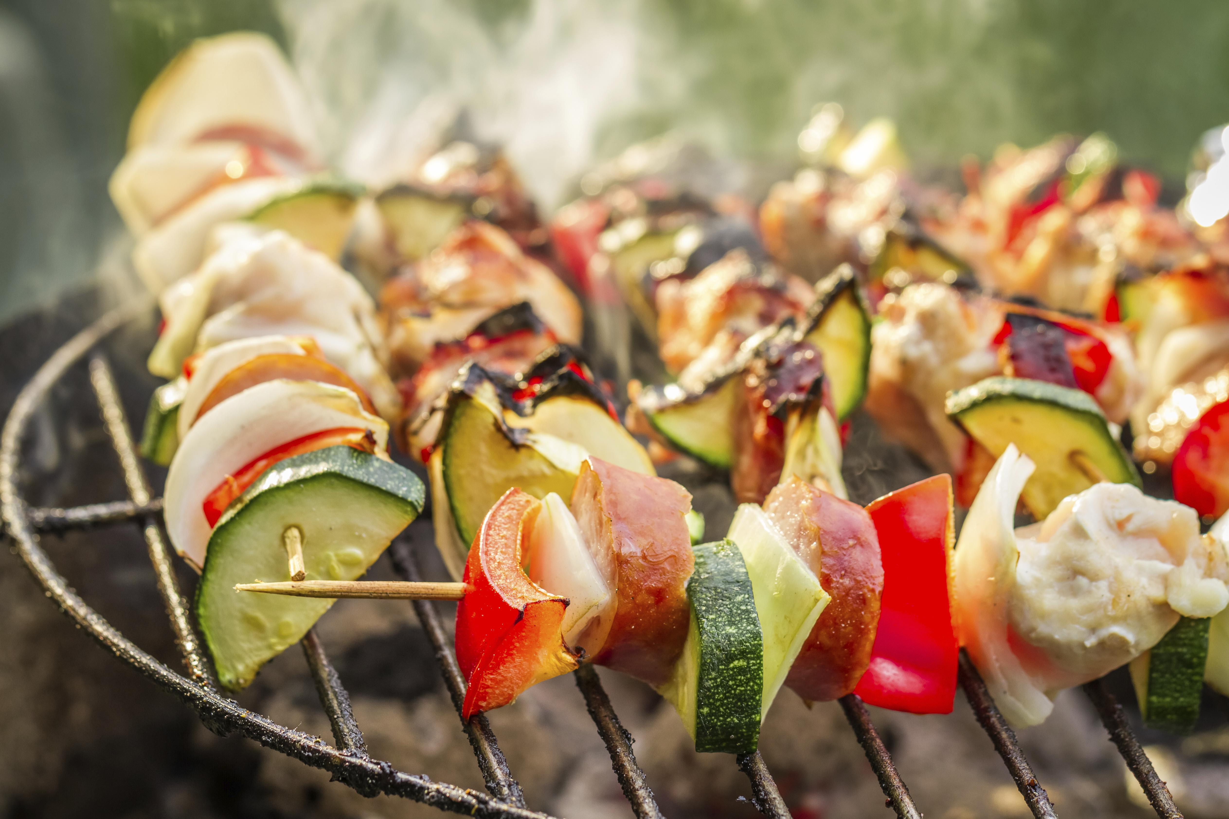 Hot skewers on the grill with fire