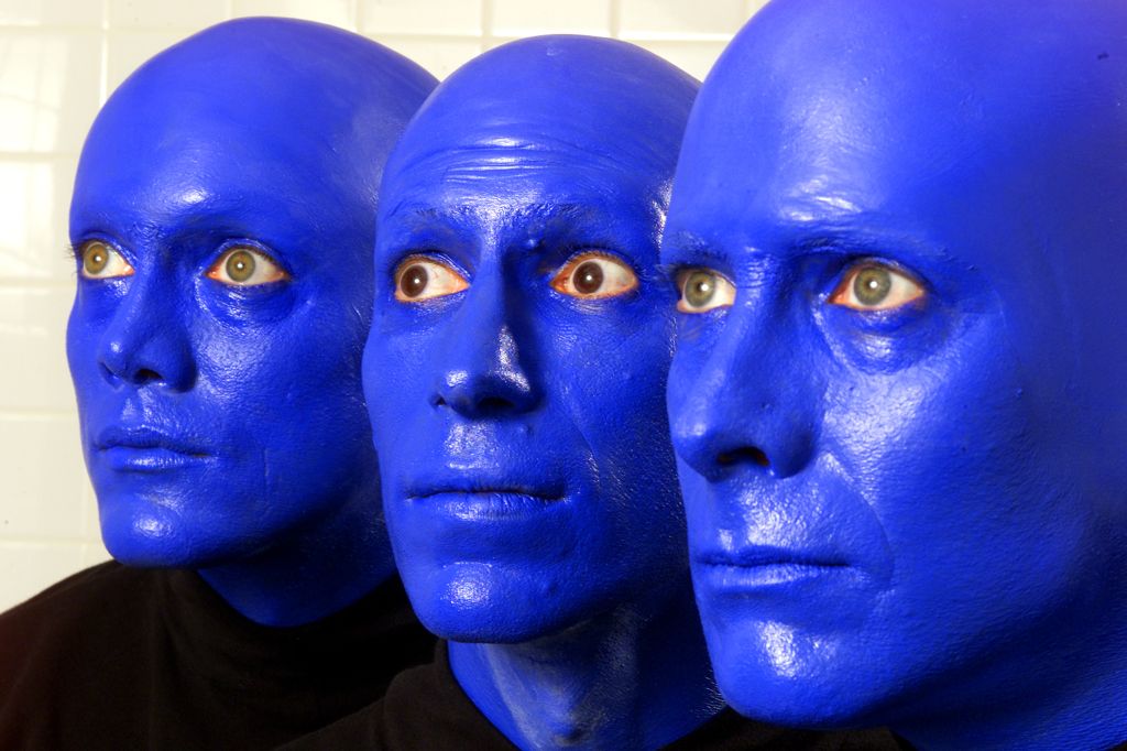 BLUE MAN GROUP is a trio of performance artists who perform with their heads painted blue. They've b