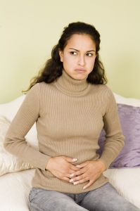 Woman with Upset Stomach