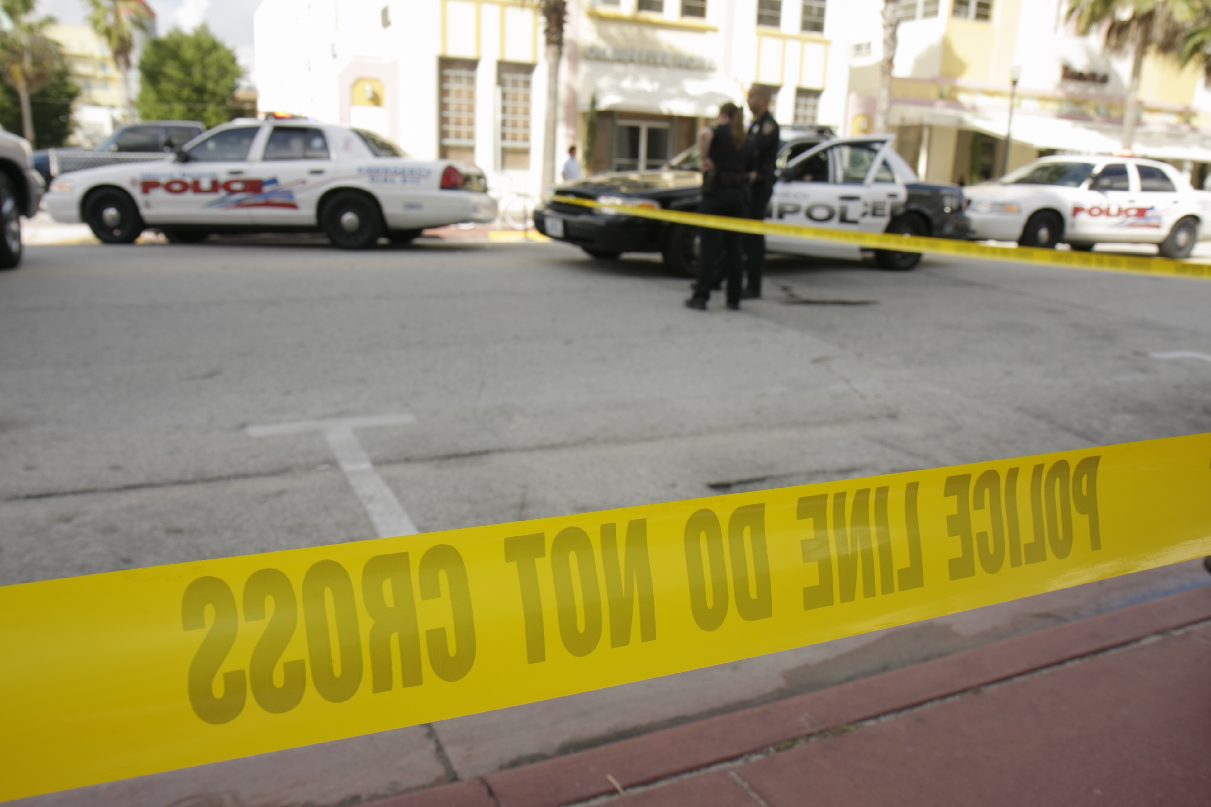 Police tape at an accident scene on Ocean Drive.
