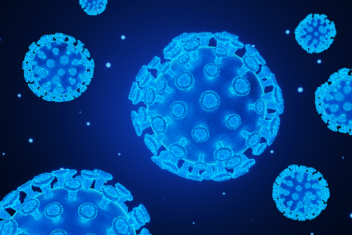 Neon glowing blue virus floating in mid air on a black background. Illustration of the concept of bacteria, diseases, pandemics and hygiene.