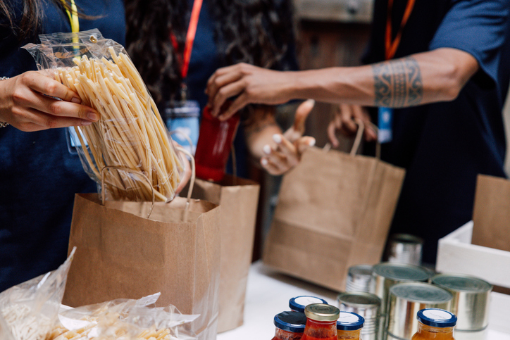 Essential Food Supplies Being Packed by Volunteers